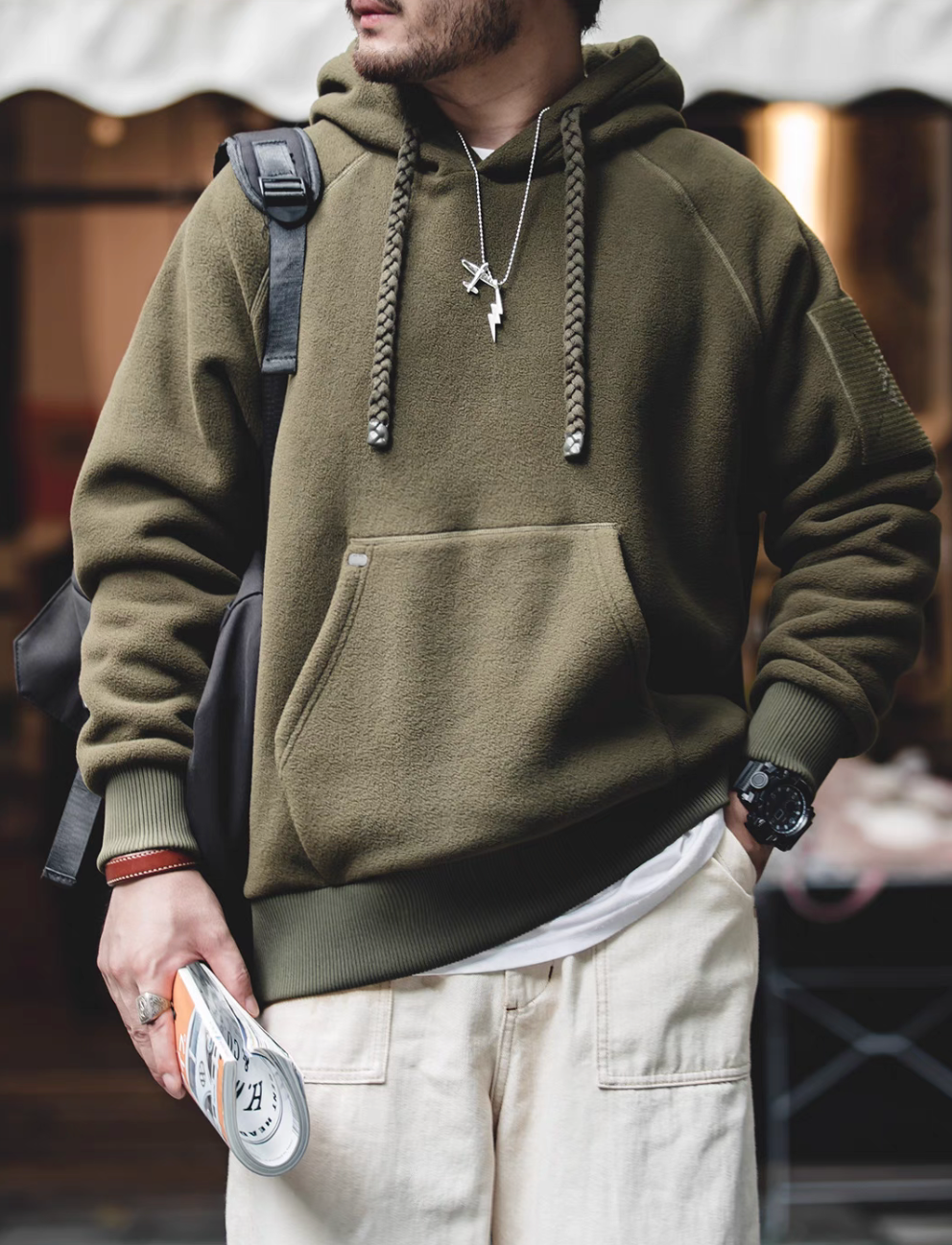 RidgeLine Fleece Hoodie in olive green front view featuring kangaroo pocket, braided drawstrings, and soft fleece material for daily wear