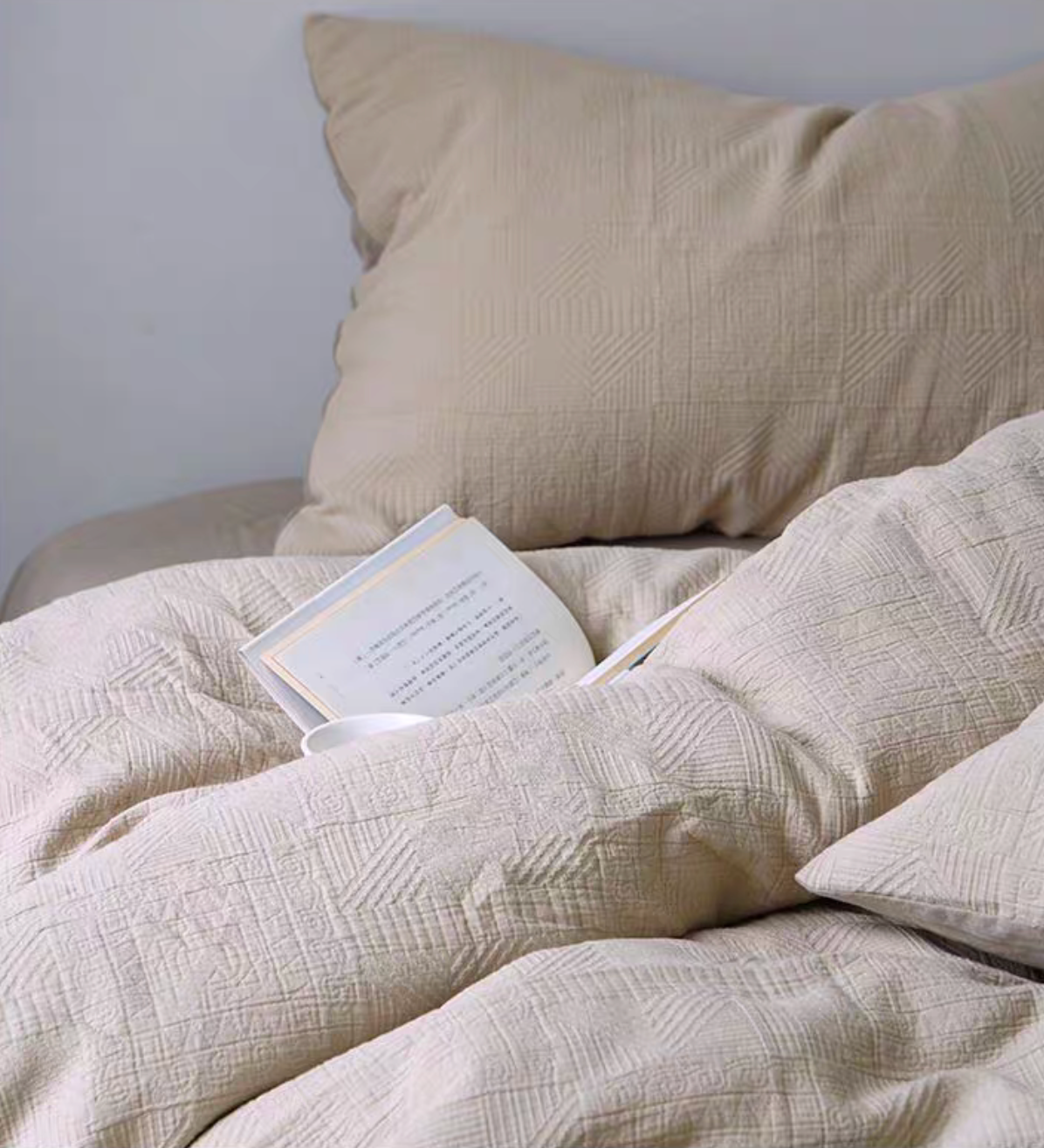 Rock Point Wheat Ear Cream cotton comforter draped across bed showing natural breathable cotton pattern