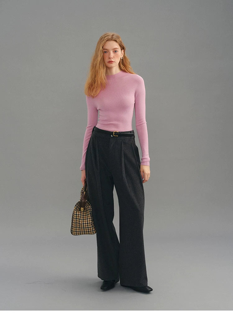 Dusty pink seamless wool sweater, full body front view with bag
