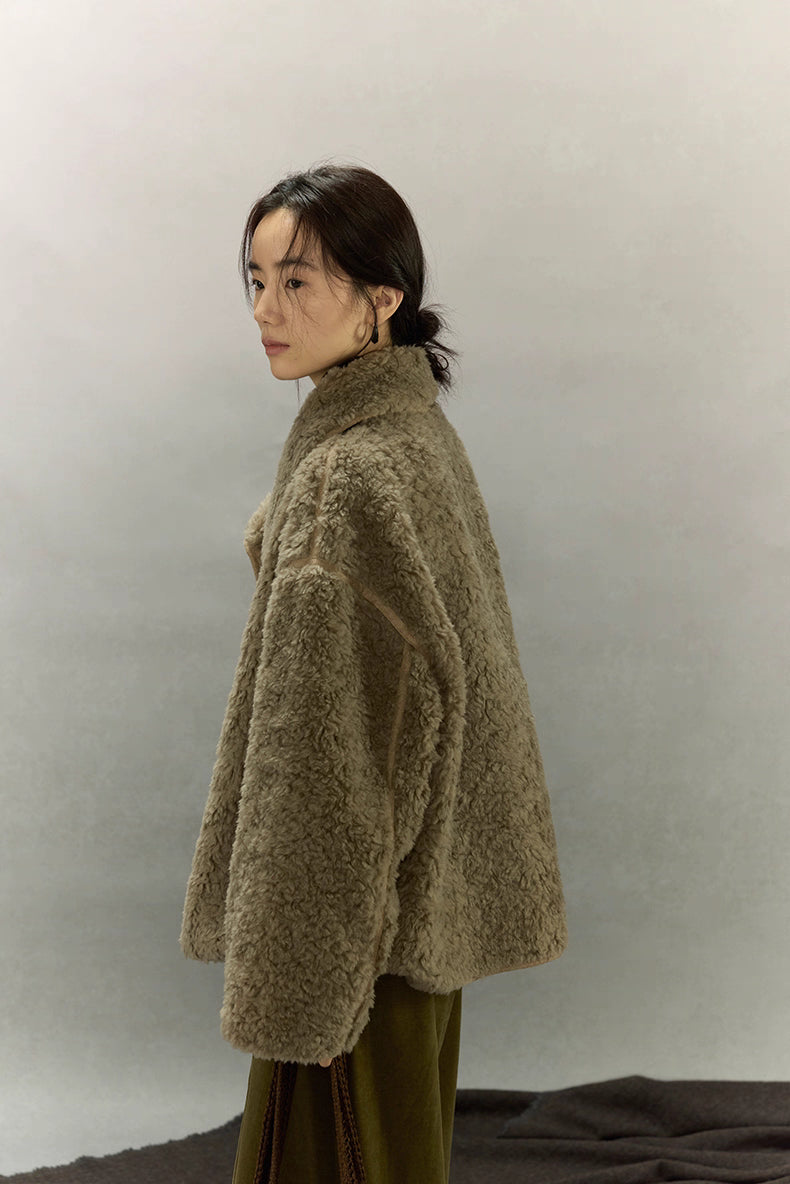 Side profile of sherpa wool jacket highlighting dropped shoulders