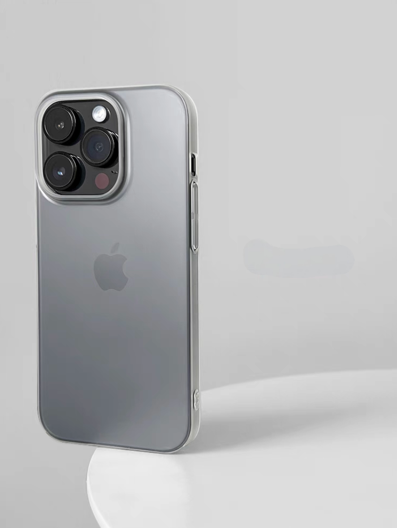 Matte white phone case on iPhone standing upright with soft frosted finish and clean minimal look