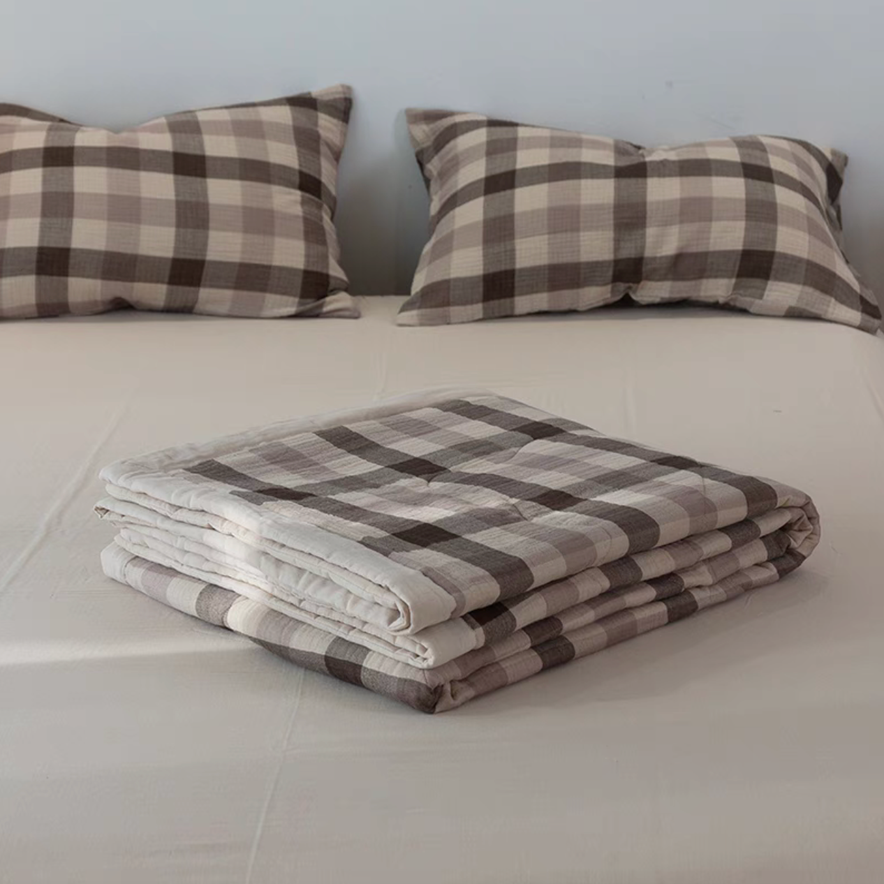 Beige Coffee Stripes SoftNest cotton muslin bedding set styled on bed with matching striped pillow shams