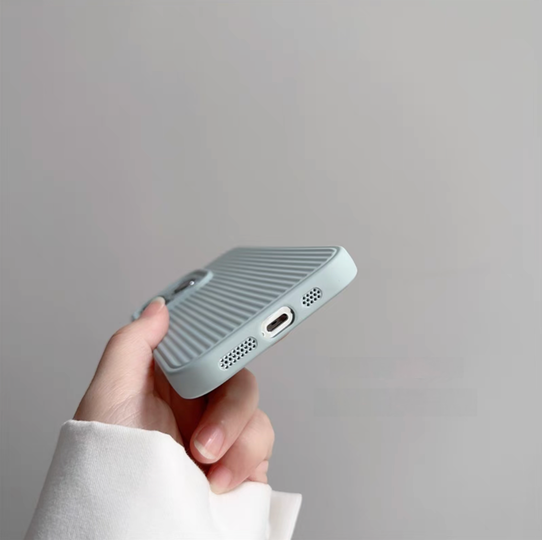 Green striped shockproof phone case bottom detail showing charging port and speaker cutouts