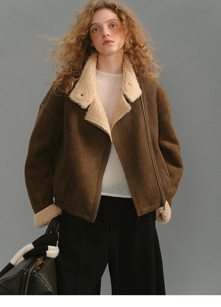 Front view of caramel brown suede shearling jacket with cream lining.