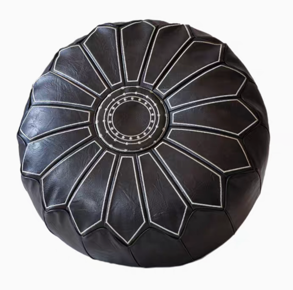 Black sunburst embroidered faux leather pouf ottoman top view with contrasting stitched pattern