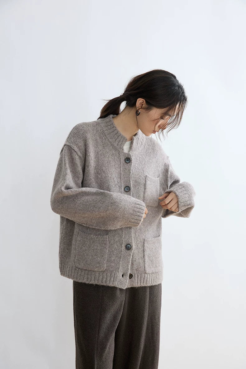 Taupe alpaca wool cardigan, close-up of button placket and chest pocket
