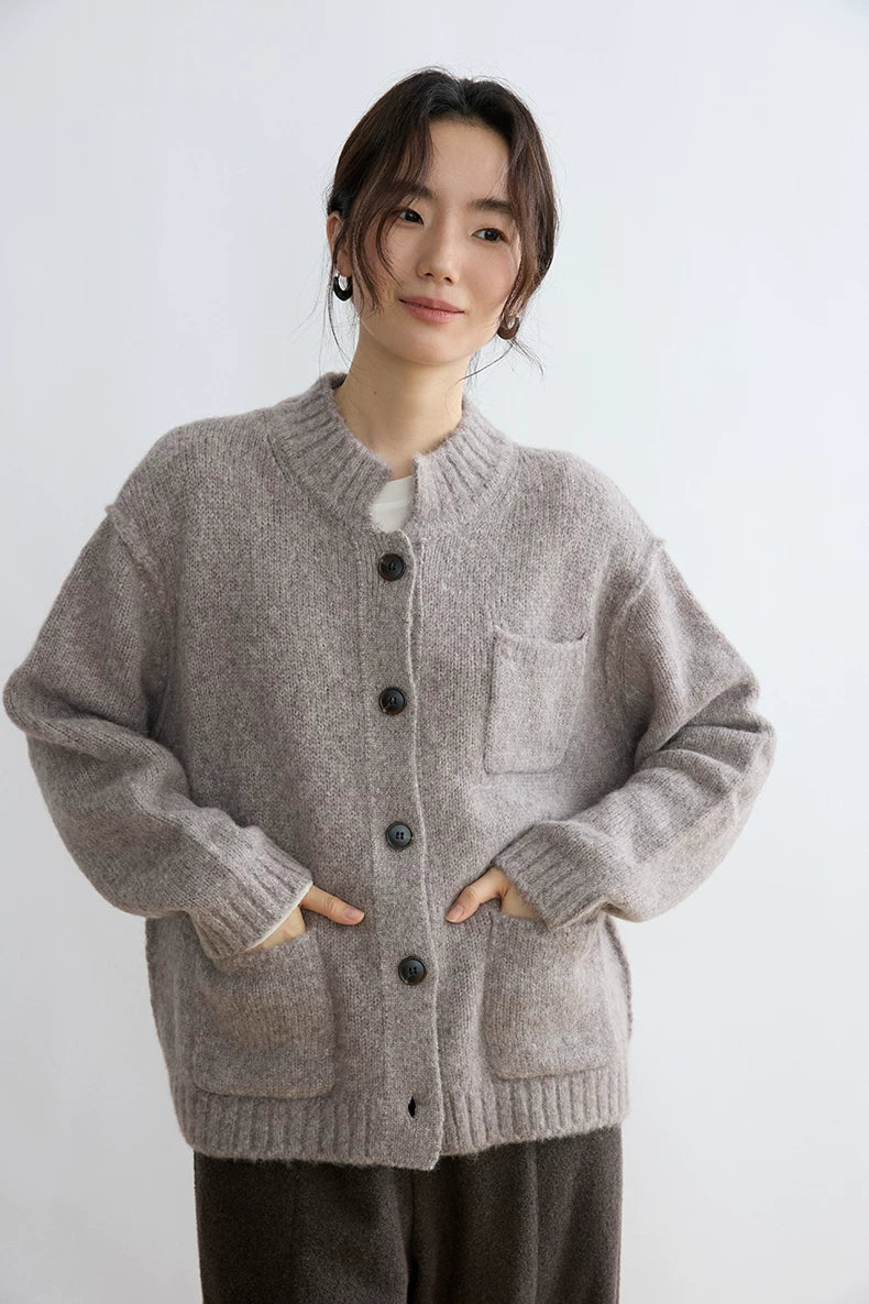 Taupe alpaca wool cardigan, close front view with pocket detail