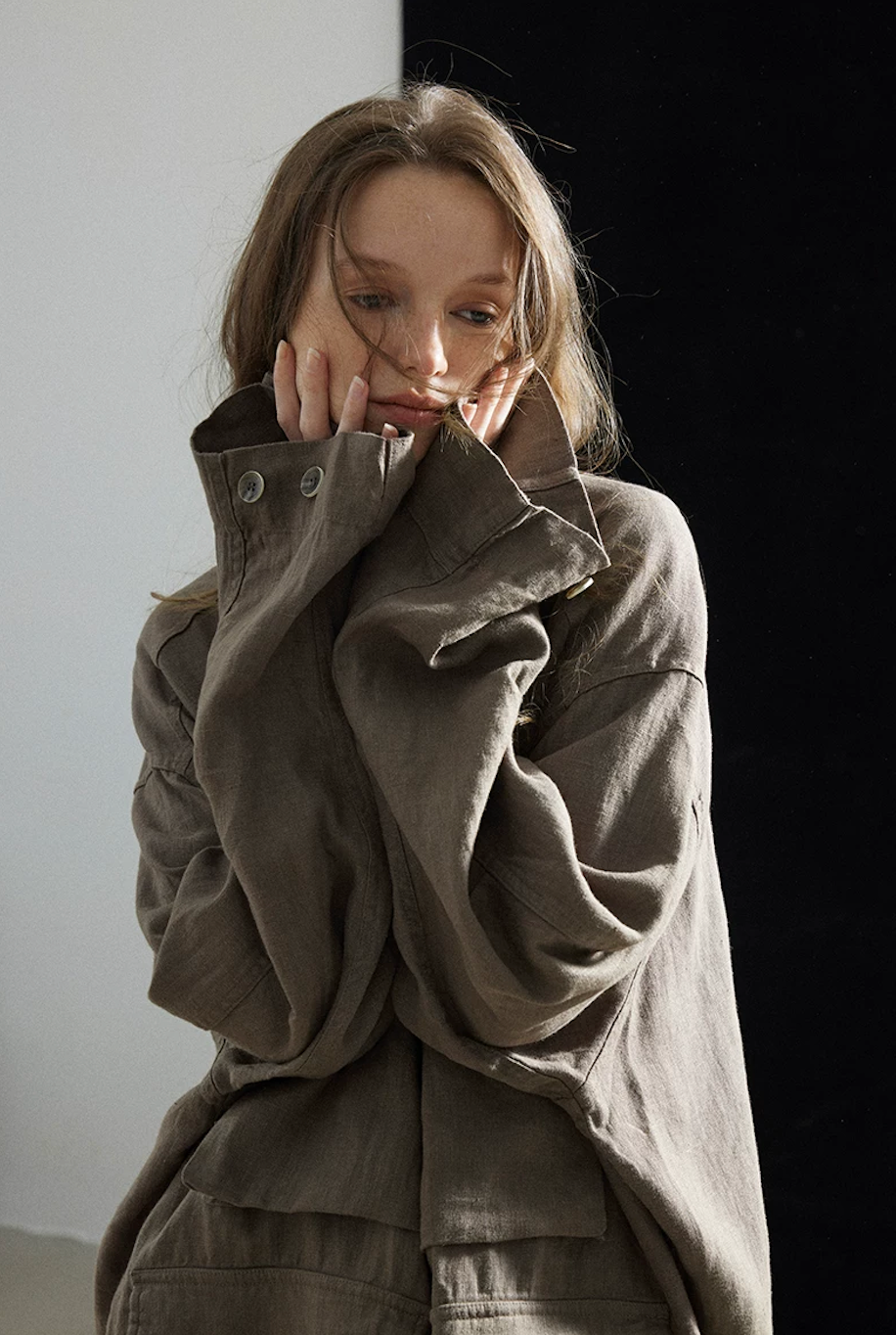 Close-up of a taupe linen shacket&