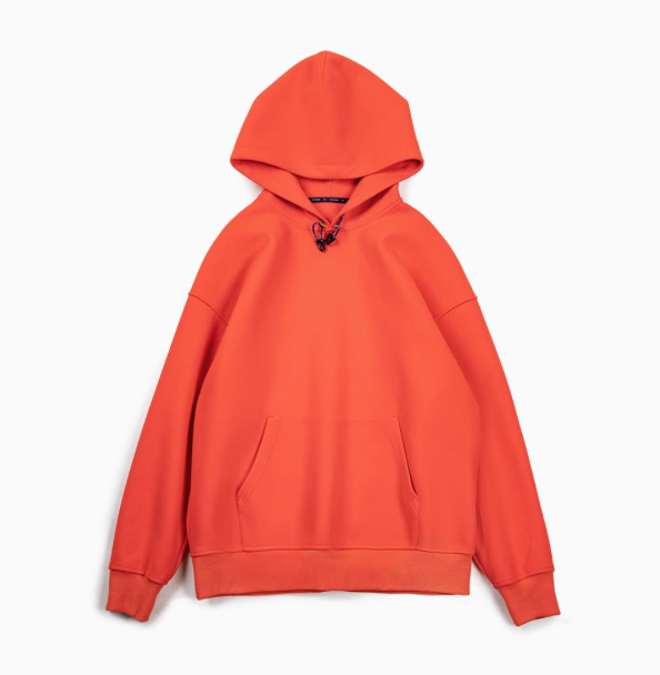 Trailblazer Pullover Hoodie in orange front flat lay view featuring drawstring hood and kangaroo pocket design