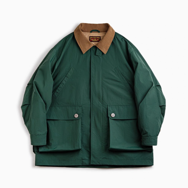 Utility Field Jacket in Dark Green front view showing corduroy collar, double closure and oversized flap pockets