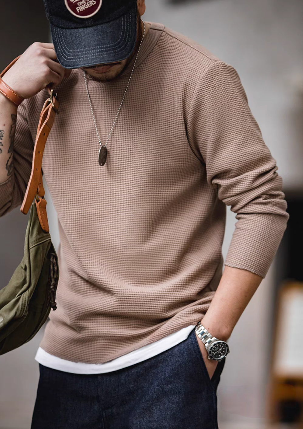 Coffee waffle knit heavyweight crew sweatshirt worn by model upper body view casual styling with crossbody bag
