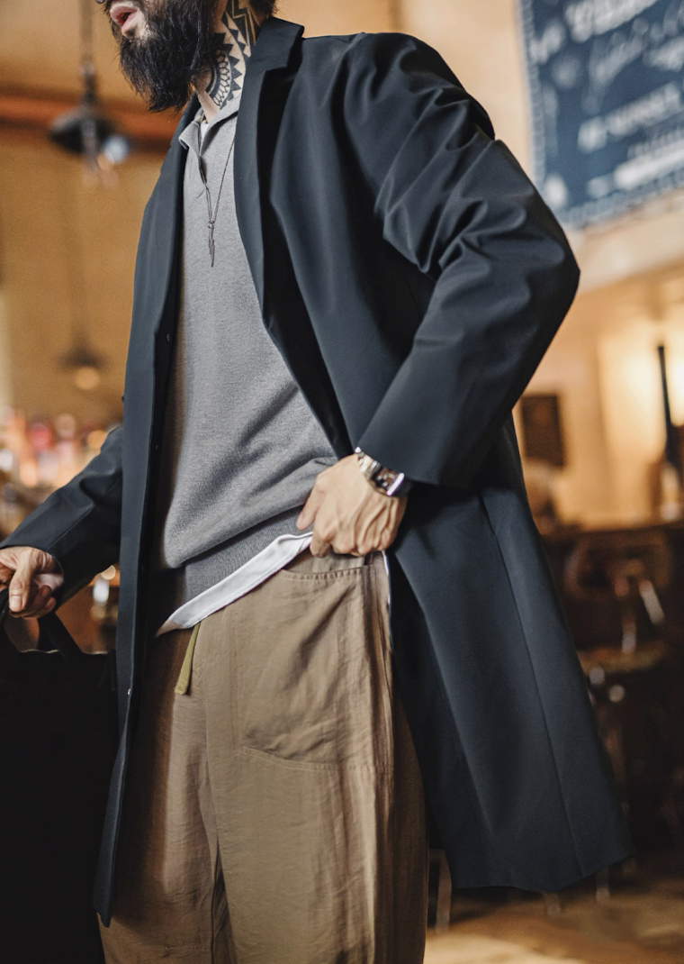 Men’s navy waterproof Mac coat styled for city commute