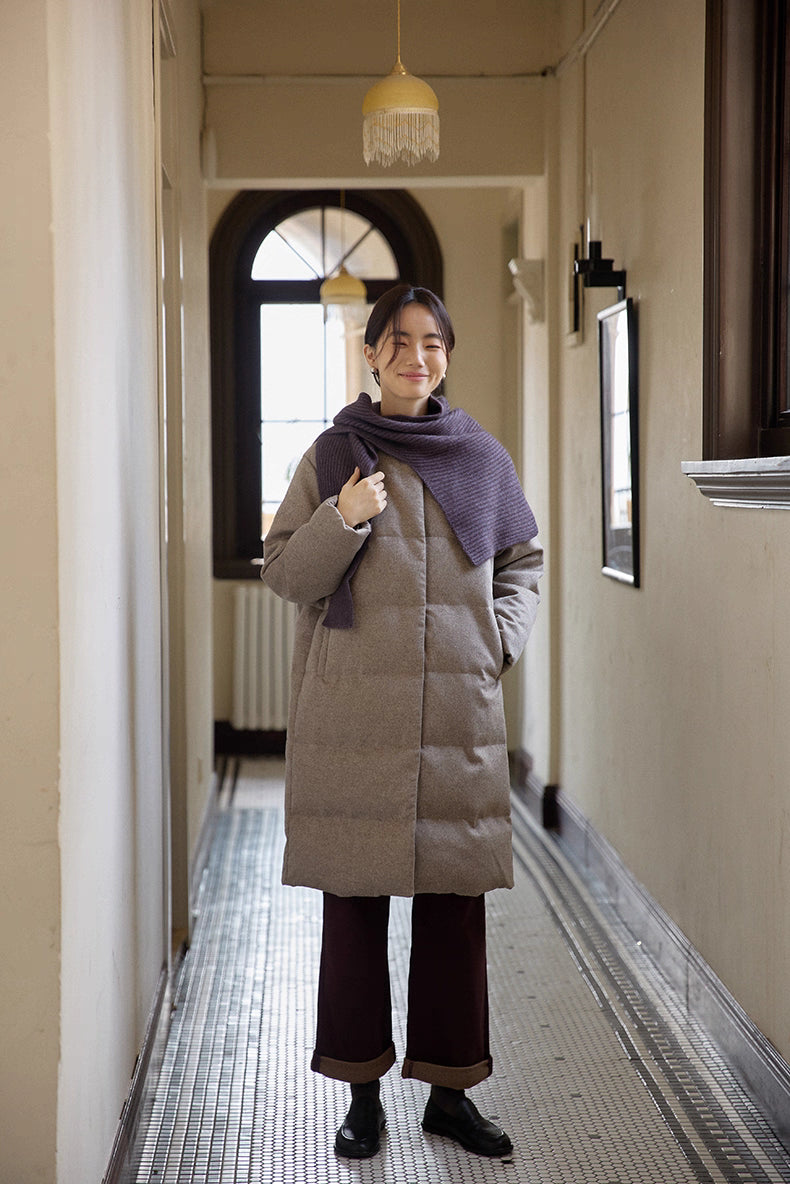 mid-calf wool-blend long down coat styled with scarf and dark pants