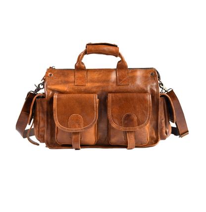 Front view of camel brown full-grain leather weekender bag with dual flap pockets