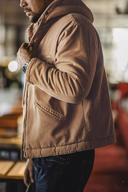 Side view of man in khaki sherpa-lined jacket, casual outfit