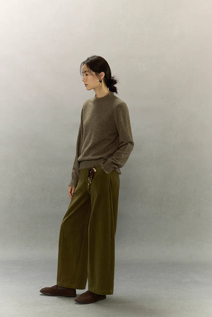 Side profile of yak wool sweater showing soft brushed surface and minimal silhouette.