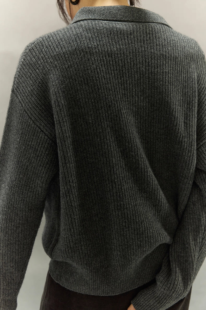 Back view highlighting rib knit texture and natural drape of the wool-cashmere sweater.