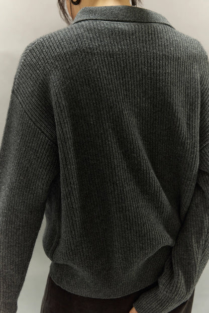 Back view highlighting rib knit texture and natural drape of the wool-cashmere sweater.