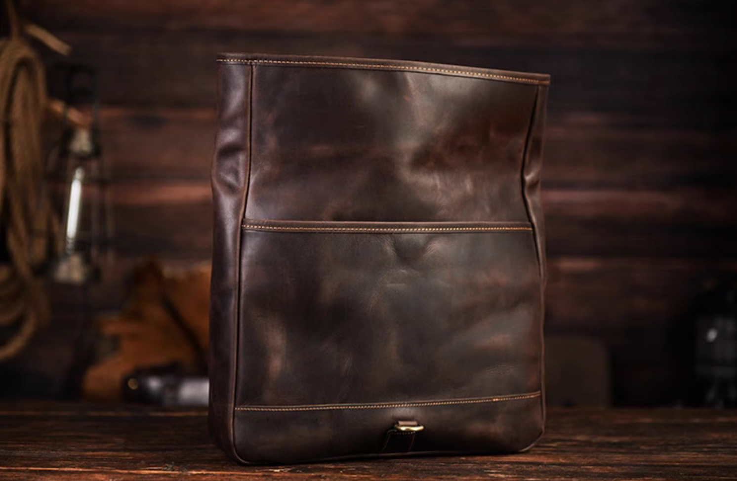 Rear view highlighting external zipper pocket and structured full-grain leather surface