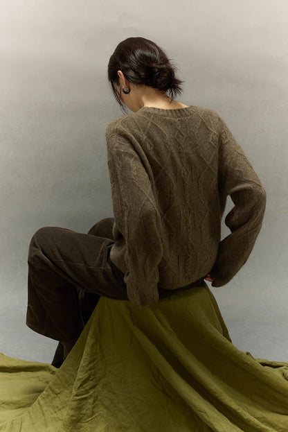 Back view of yak wool sweater displaying complete diamond knit pattern.