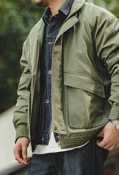 Half-body shot of Army green Flight Jacket 074 with front flap pockets