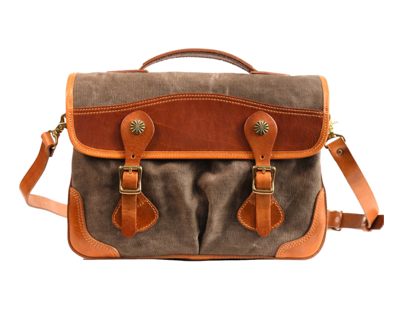 Front view of khaki grey canvas satchel with tan leather accents