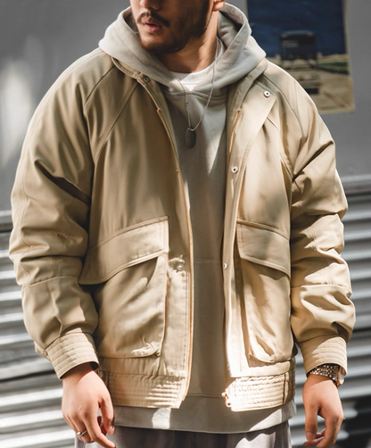Model wearing Khaki Flight Jacket 074 layered over beige hoodie