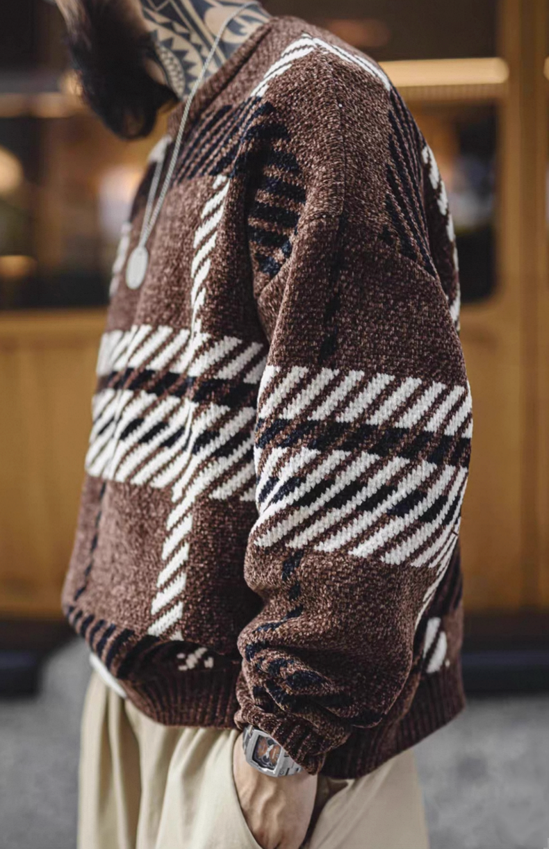 Close-up sleeve detail of retro brown chenille sweater, textured plaid knit