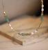 Bamboo pearl necklace with aventurine beads freshwater pearls and agate close-up showing green bamboo-shaped stones and gold accents
