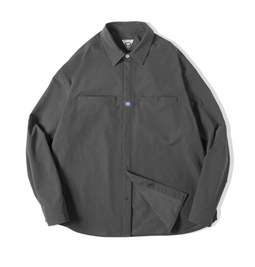 Men’s dark charcoal utility overshirt jacket laid flat to show overall front design.