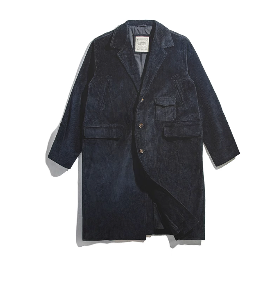 Men’s navy corduroy overcoat flat lay showing full front design with button closure.