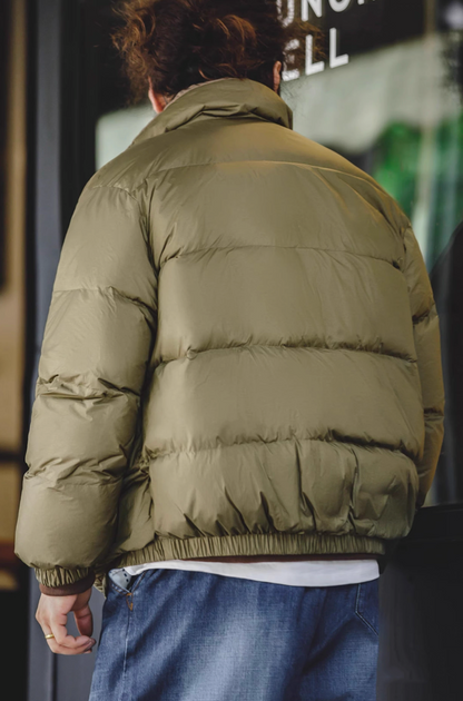 Back view of army green Reversible Down Jacket showing quilted texture and fit