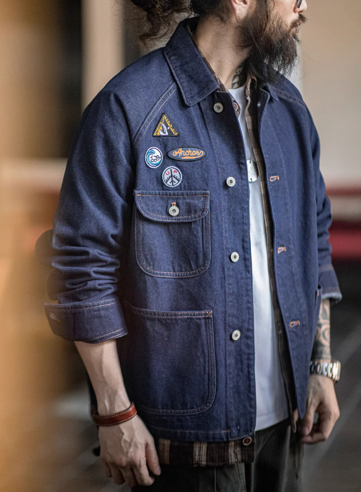 Model styling denim workwear jacket in relaxed streetwear outfit