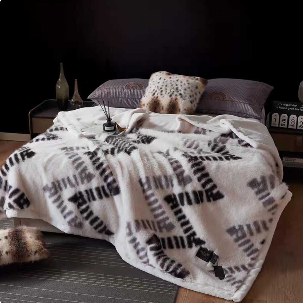 Pearl White long-pile faux fur luxe throw blanket styled on bed with soft fluffy texture and elegant neutral tone