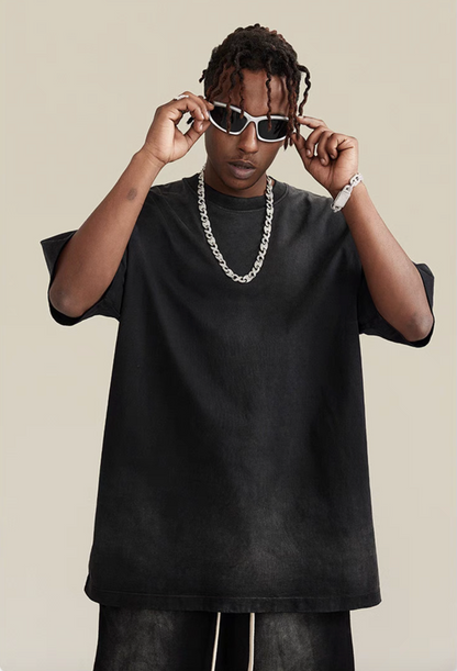 Casual gradient oversized t-shirt in black worn by model close-up view