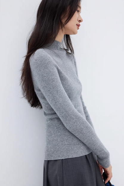 Side profile of soft gray cashmere sweater with slim fit design, classic winter fashion