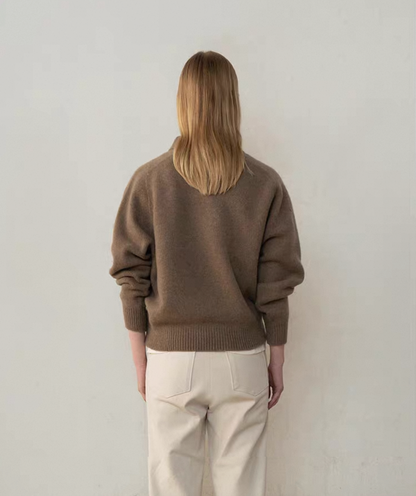 Side view of brown wool cashmere polo sweater with button placket
