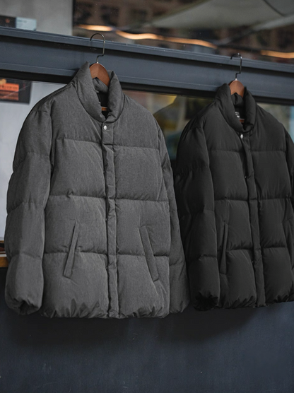 Grey and black Dual-Tone Down Jackets hanging side by side on rack