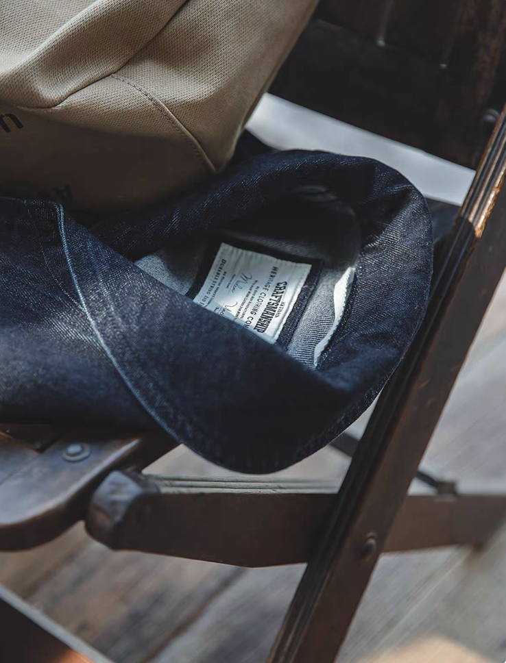 Close-up of shawl collar and label of Heritage Indigo Denim Jacket