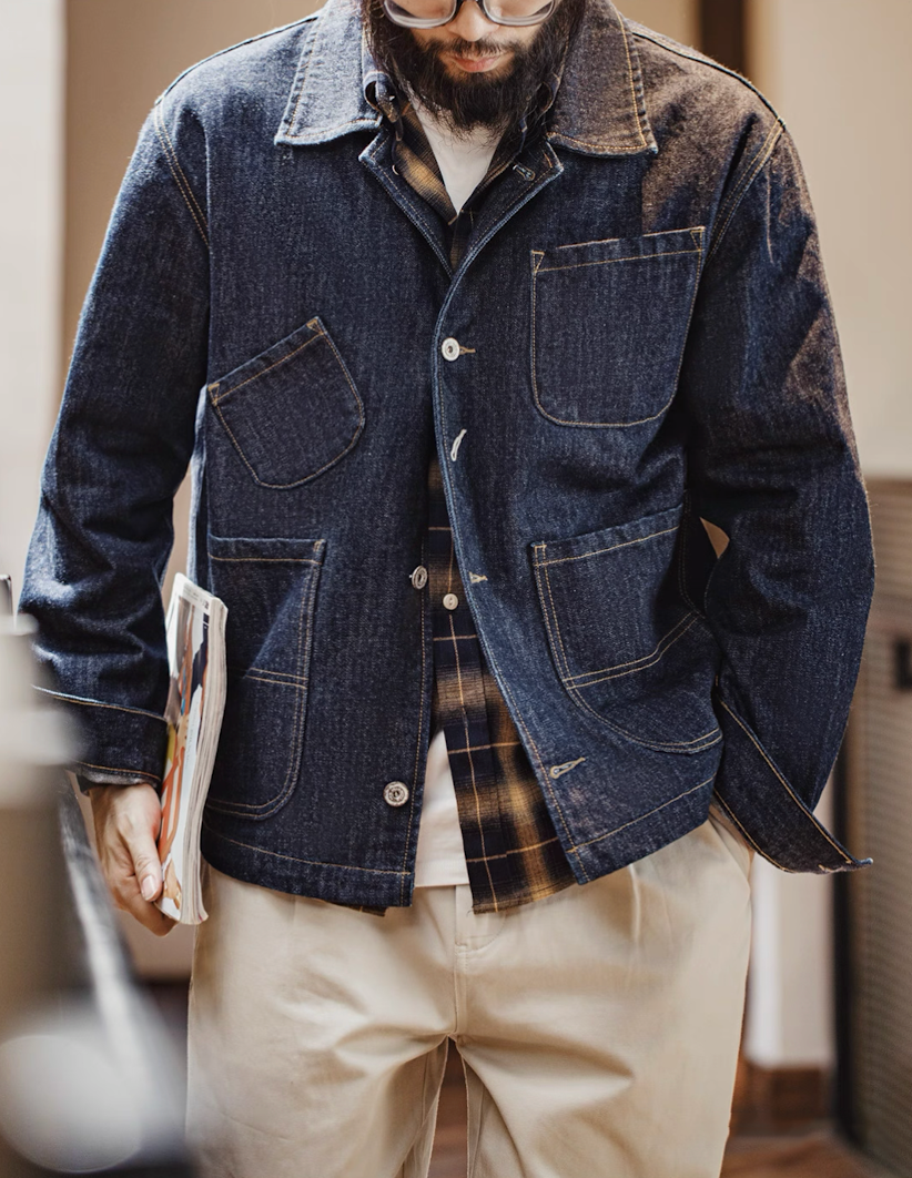 Model wearing Denim 4-Pockets Work Coat with plaid shirt and beige pants