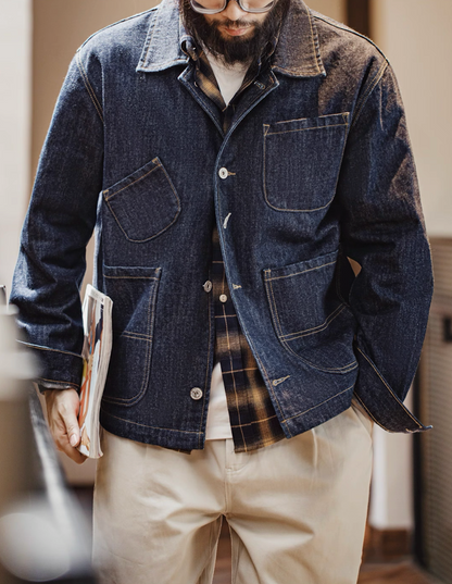 Model wearing Denim 4-Pockets Work Coat with plaid shirt and beige pants