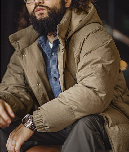 Close-up of khaki Urban Shield Jacket texture and quilting details