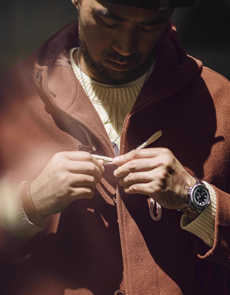 Close-up of rope and horn toggle fastening on brown coat