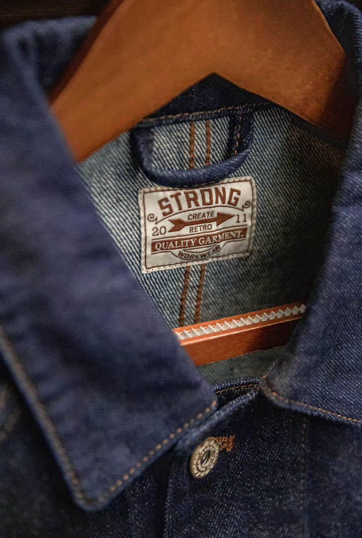 Close-up of collar label showing Strong Retro Quality Garment