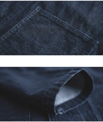 Close-up of front pocket and sleeve finish on indigo workwear jacket