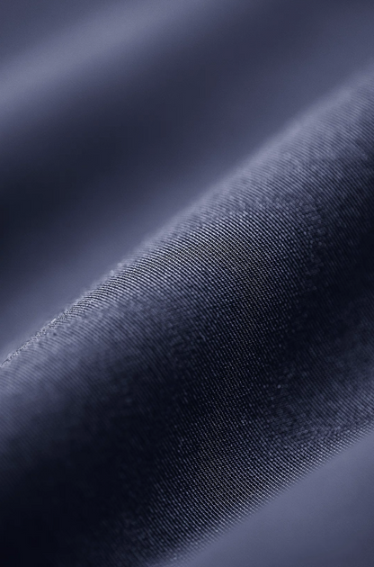 Smooth polyester fabric texture of navy bomber jacket