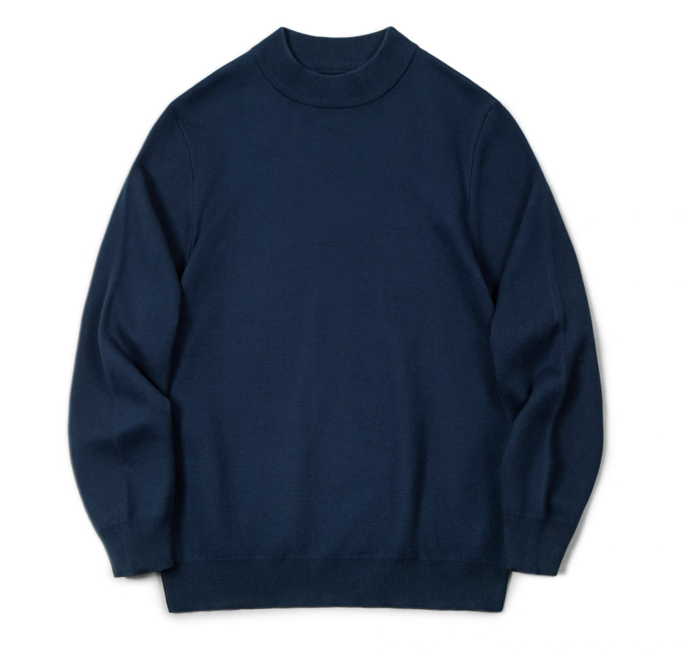 Sand beige sweater styled with white overshirt for fall layering