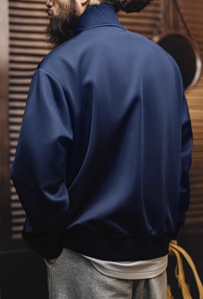Back view of Riverdale Run navy track jacket with ribbed hem finish