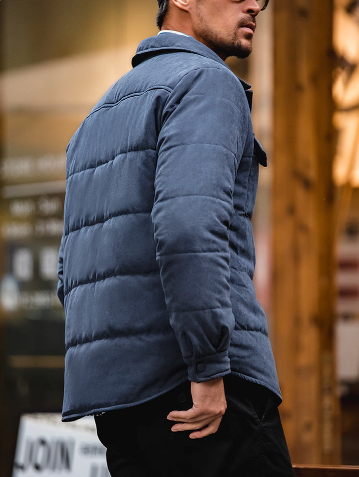 Back angle of Midnight Blue Softshell Puffer Overshirt highlighting quilt panels