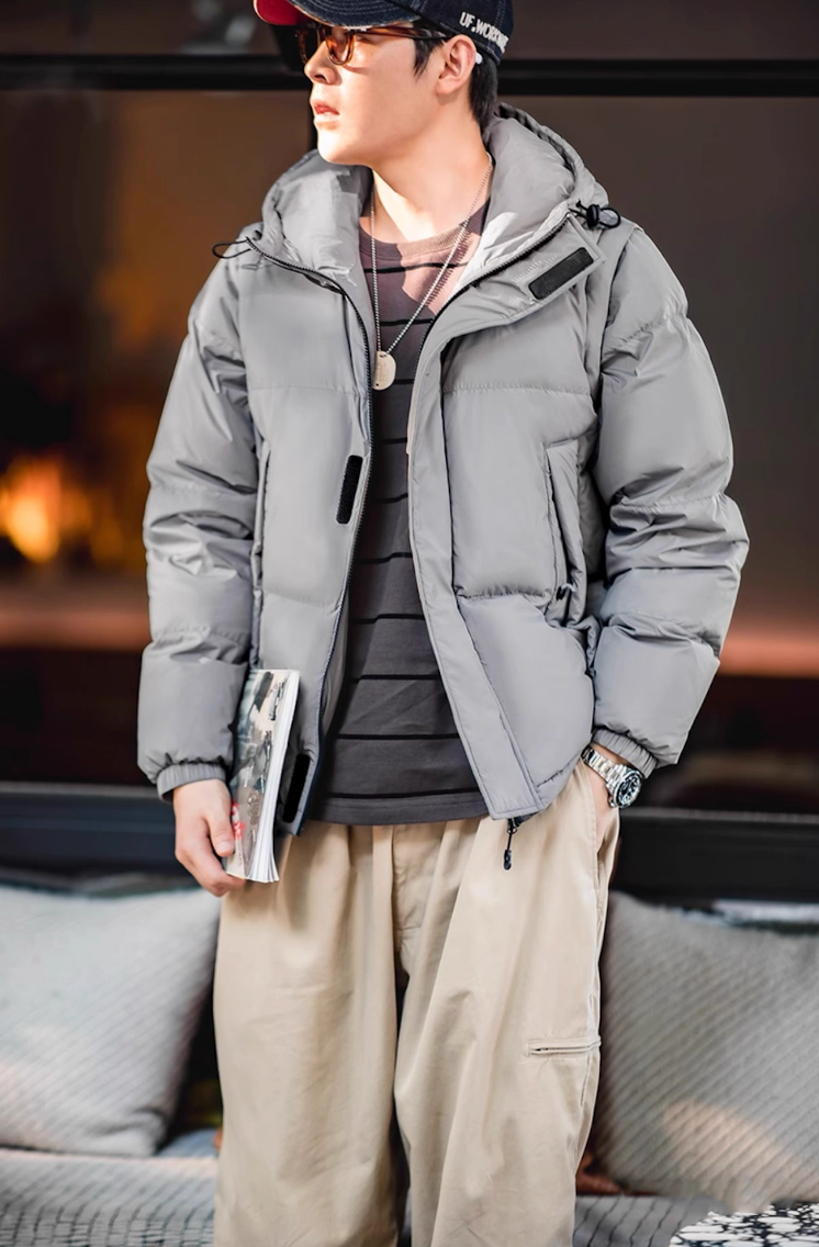 Model wearing grey Versatile Parka outdoors with cargo pants